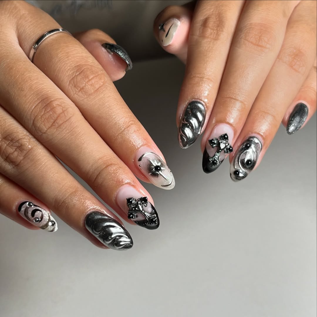 Chrome metallic nail art with embellished details