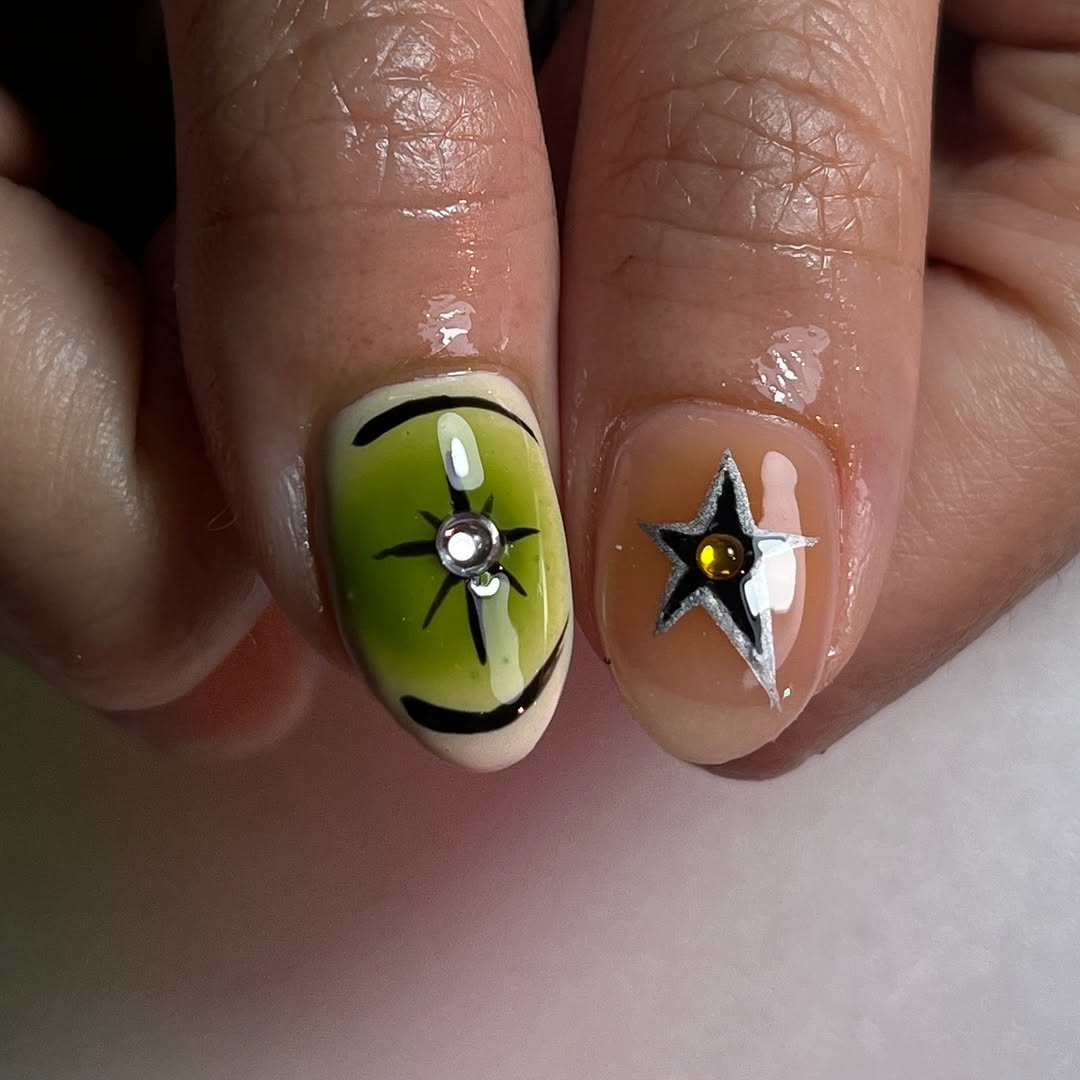 3D gel nail art with sculpted star detail